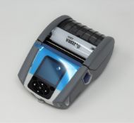 A boxed as new Zebra ZQ620 Healthcare Mobile Thermal Label Printer (P/N: ZQ62-HUWAE00-00) with a