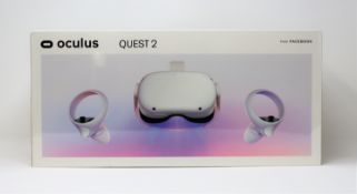 A boxed as new Oculus Quest 2 128GB VR headset and touch controllers in white.
