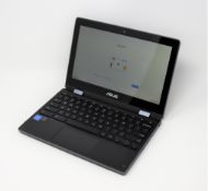 A pre-owned boxed Asus Flip C214M 11.6