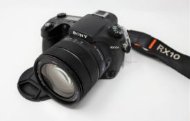 A pre-owned Sony RX10 III Superzoom Camera (No battery included. Untested, sold as seen).