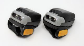 Two pre-owned Symbol RS507 Bluetooth Ring Barcode Scanners (P/N: RS507-IM200000TWR) with battery.