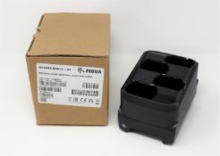 A boxed as new Zebra MC3300 4-Slot Battery Charger (P/N: SAC-MC33-4SCHG-01).