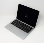 ACTIVATION LOCKED - SOLD FOR PARTS - A pre-owned 13