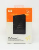 A boxed as new WD My Passport 5TB portable hard drive in black.