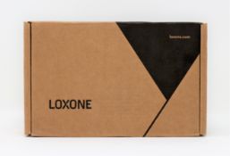 A boxed as new Loxone Relay Extension (Box sealed).