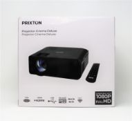 A boxed as new Prixton Cinema Deluxe Projector (Box sealed).