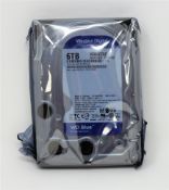 A boxed as new Western Digital 6TB BLUE 256MB 3.5IN SATA 6GB/S 5400rpm Hard |Drive (M/N: WD60EZAZ-