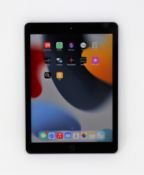 A pre-owned Apple iPad 9.7