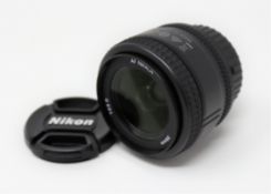 A boxed as new Nikon Nikkor AF 28mm f/2.8D Lens.