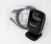 A pre-owned Motorola DS9208 Barcode Scanner with as new cable.