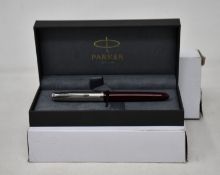 Two boxed as new Parker 51 Fountain Pens in burgundy.
