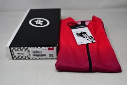 An as new Assos Uma GT C2 Shifter short sleeve cycling jersey in foxyriser pink (XL).