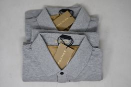 Two as new Burberry polo shirts in grey (L).