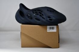 A pair of as new Adidas Foam RNNR (UK 11).