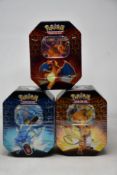 Three sealed as new Pokemon Hidden Fates tins (Complete tin set).