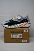 A pair of as new Adidas Yeezy Boost 700 with authentication tag (UK 9).