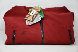 A women's as new RVRC Race Revolution Monsoon jacket in chilli (L) (Slight dust mark to front of