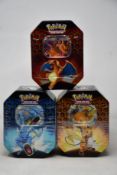 Three sealed as new Pokemon Hidden Fates tins (Complete tin set).