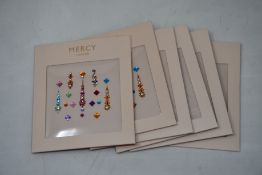 Fifty packs of as new Gigi Bindi Rainbow Coloured Crystals from Mercy London (Indian face jewels).
