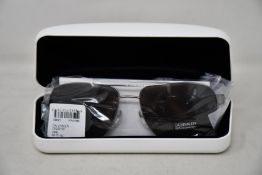 A pair of as new Calvin Klein sunglasses.