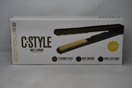 A boxed as new Corioliss C-Style Gold Leopard Professional Hair Styling Iron.