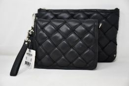 Two as new Depeche handbags.