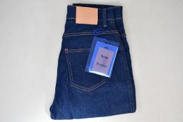 A pair of as new ACNE Studios 1994 indigo jeans (W26/L32).