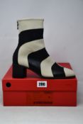 A pair of as new Arche Teobiz boots (EU 39).