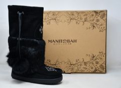 A pair of as new Manitobah Mukluks Revival boots (Size L6).