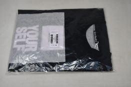 An as new ACNE Studios Exford Slogan T-shirt (XL - RRP £139).