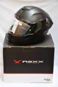 A boxed as new NEXX SX.100R MT helmet in Full Black (Size: M).