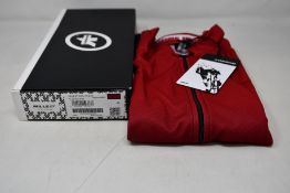 An as new Assos Mille GT C2 Shifter cycling jersey in vignaccia red (XL - RRP £110).
