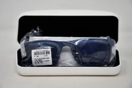 A pair of as new Calvin Klein sunglasses.