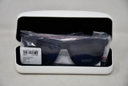 A pair of as new Calvin Klein sunglasses.