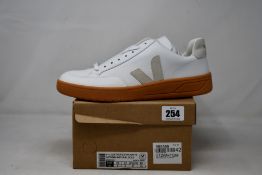 A pair of as new Veja V-12 trainers (UK 8).
