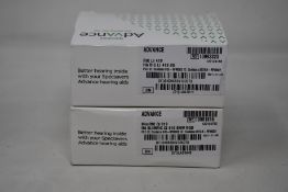 Two boxed Specsavers Advance Hearing aids; SlimRIC QI 819 SNW RGD and RIC LI 419 BG.