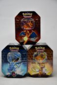 Three sealed as new Pokemon Hidden Fates tins (Complete tin set).