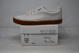 A pair of as new Cos sneakers (EU 38).