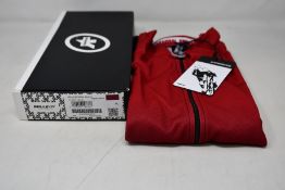An as new Assos Mille GT C2 Shifter cycling jersey in vignaccia red (XL - RRP £110).