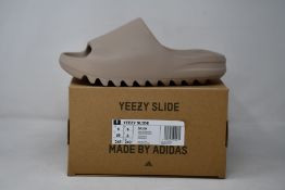 A pair of as new Adidas Yeezy Slide (UK 6).
