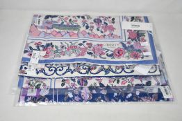 Four assorted as new Liberty of London scarves.
