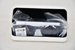 A pair of as new Calvin Klein sunglasses.