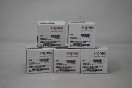 Five boxed as new Signia Contrast S+ hearing aids in Beige.