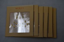 Twenty six packs of as new Gigi Bindi Gold Coloured Crystals from Mercy London (Indian face
