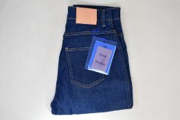 A pair of as new ACNE Studios 1994 indigo jeans (W26/L30).