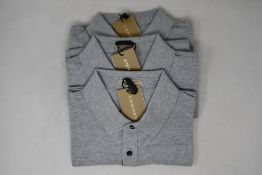 Three as new Burberry polo shirts in grey (XL).