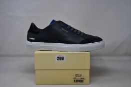 A pair of as new Axel Arigato Clean 90 Triple sneakers (UK 9.5).