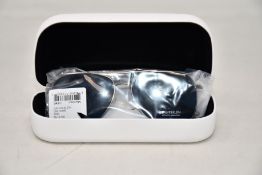 A pair of as new Calvin Klein sunglasses.