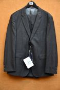 An as new Tommy Hilfiger suit in grey (EU 52).