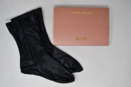 A pair of as new Wolford x Amina Muaddi vegan leather socks (L - RRP £184).